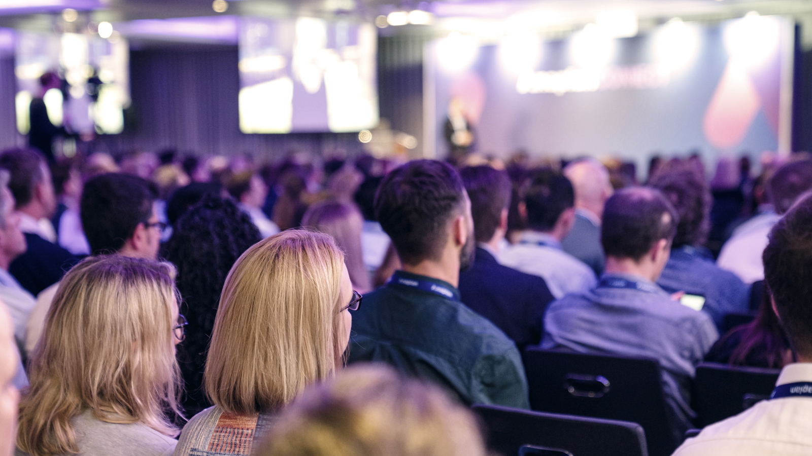Anaplan Connect Additional Tile Group of people listing to a speaker