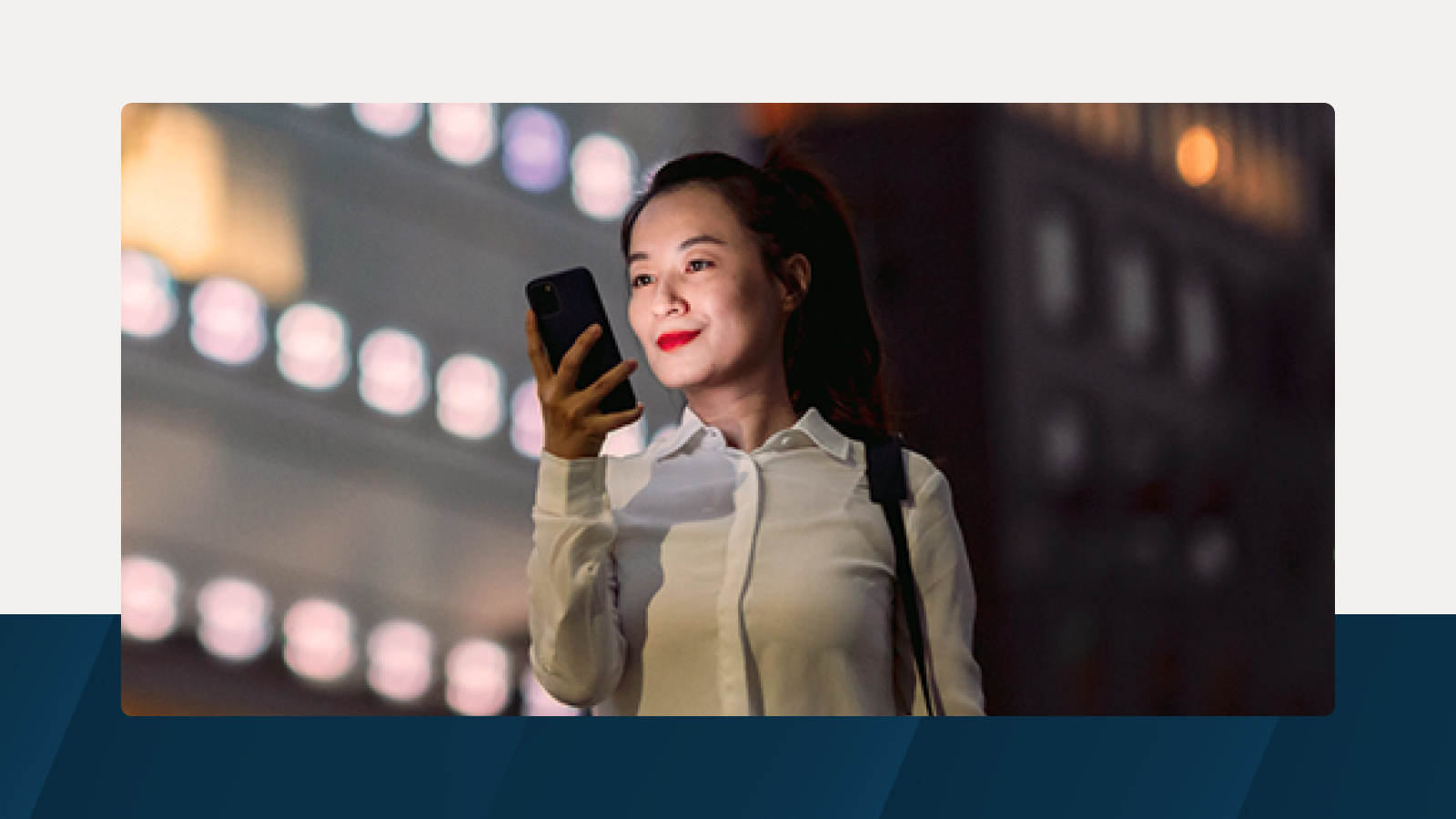 Anaplan solution brief on connected planning for capital market firms. The text highlights strategies for driving stronger performance, with an image of a professional woman using her phone at night, representing digital transformation in finance.